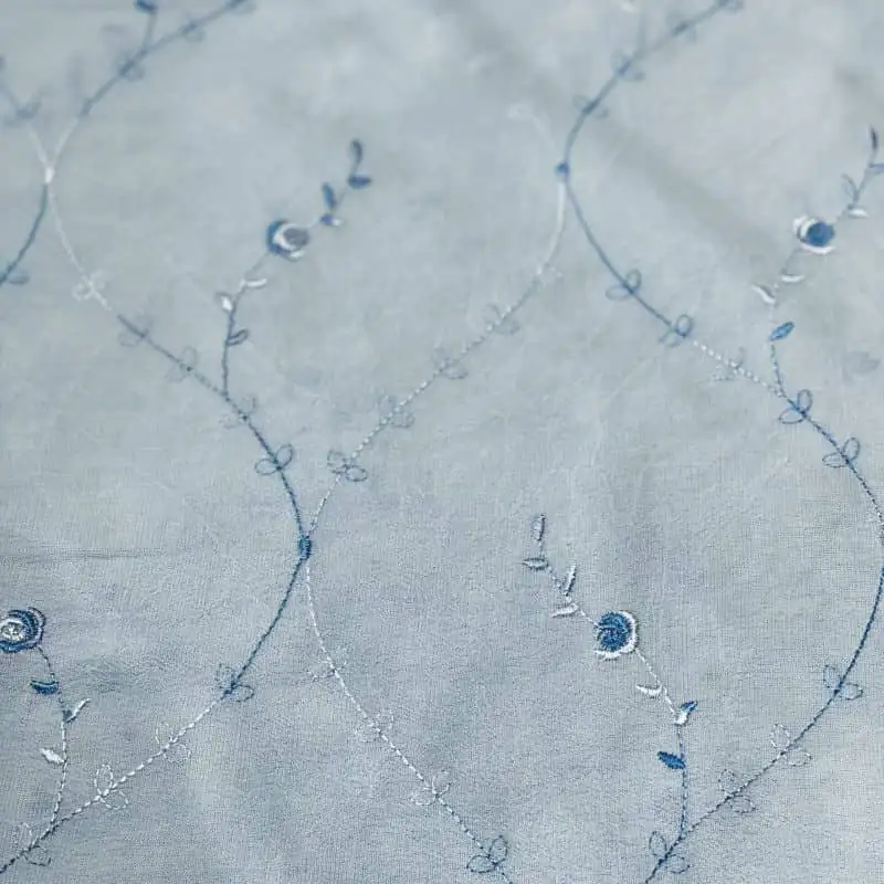 Hímzett muszlin zsorzsett kék