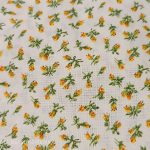 Ekrü alapon sárga apró virág mintás pamutvászon
